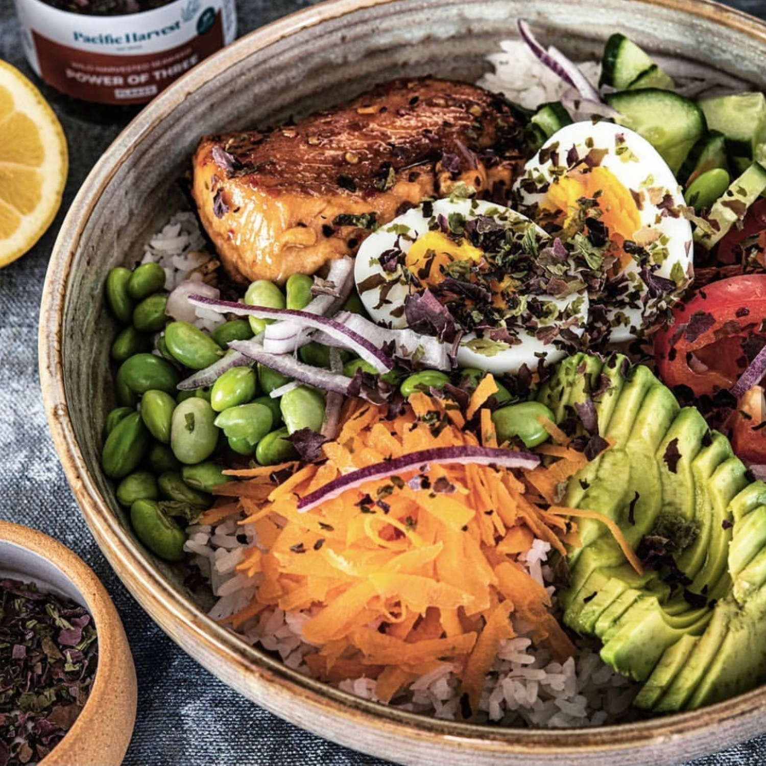 Pacific Harvest flavour umami power of three seaweed flakes on salmon poke bowl